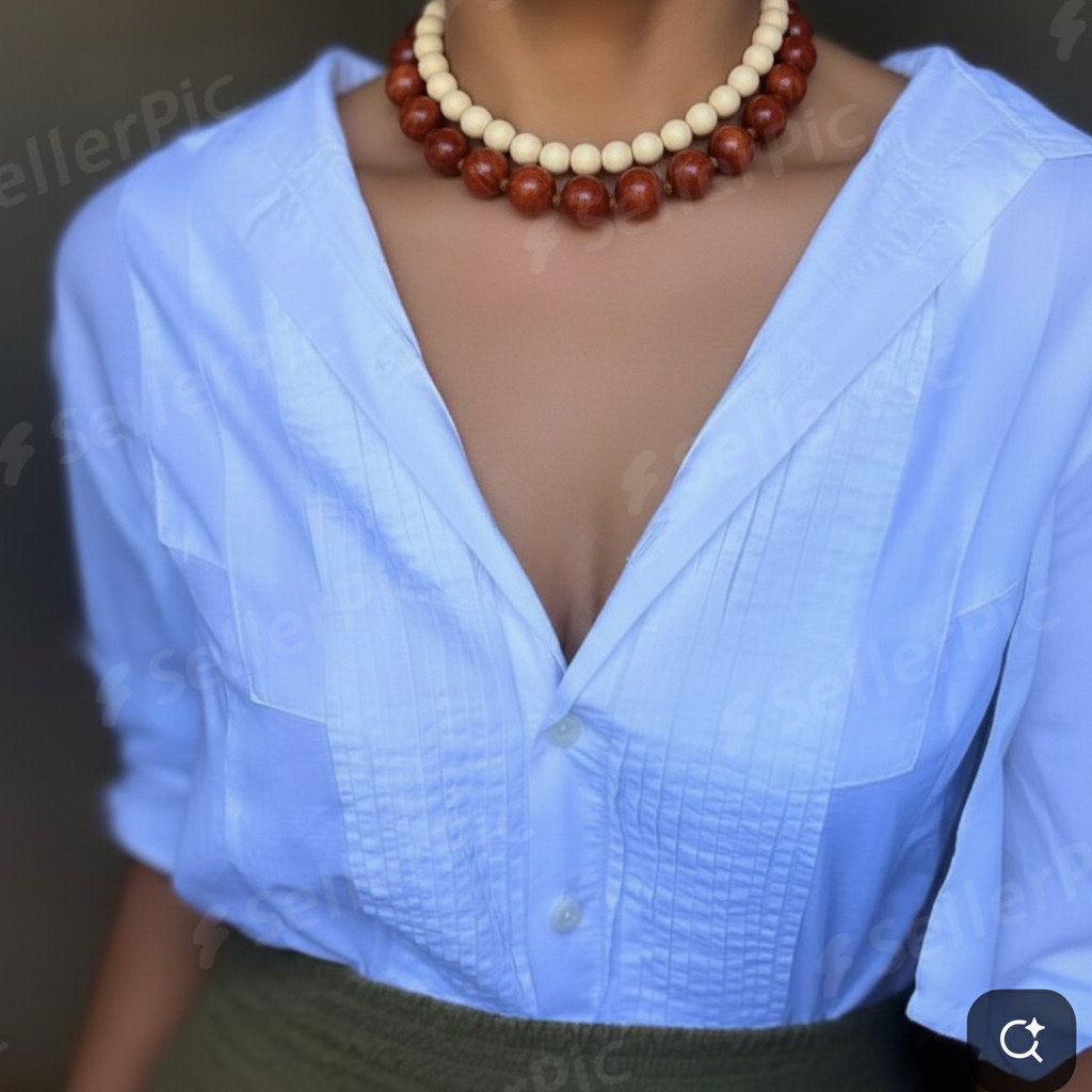 Collar de bolas marmoleadas en tono coral.